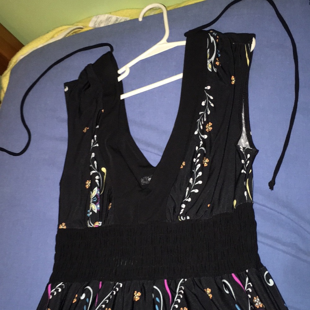 Black v neck, tie neck, feather print